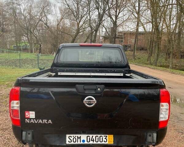 Черный Ниссан Навара, объемом двигателя 2.5 л и пробегом 165 тыс. км за 12378 $, фото 4 на Automoto.ua