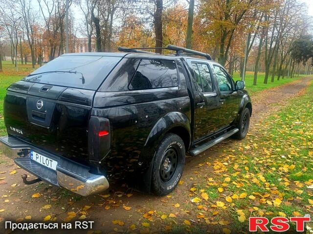 Черный Ниссан Навара, объемом двигателя 2.5 л и пробегом 260 тыс. км за 9500 $, фото 3 на Automoto.ua