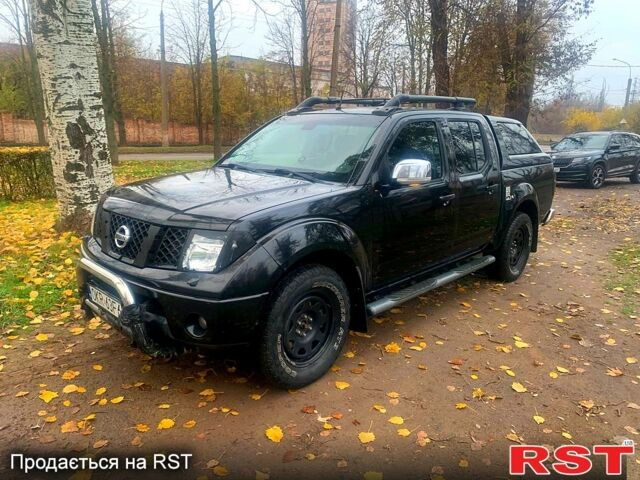 Черный Ниссан Навара, объемом двигателя 2.5 л и пробегом 260 тыс. км за 9500 $, фото 1 на Automoto.ua