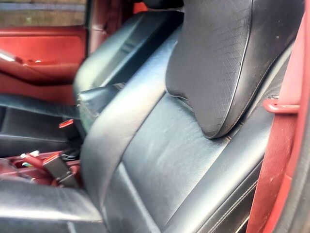 Черный Ниссан Навара, объемом двигателя 2.5 л и пробегом 370 тыс. км за 8000 $, фото 5 на Automoto.ua