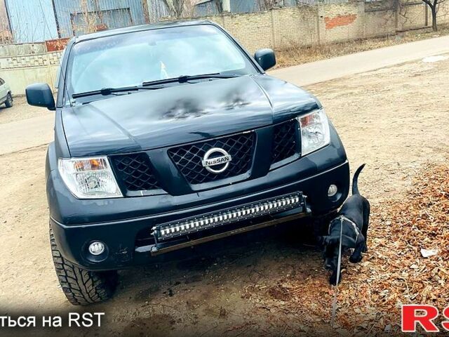 Черный Ниссан Навара, объемом двигателя 2.5 л и пробегом 370 тыс. км за 8000 $, фото 1 на Automoto.ua
