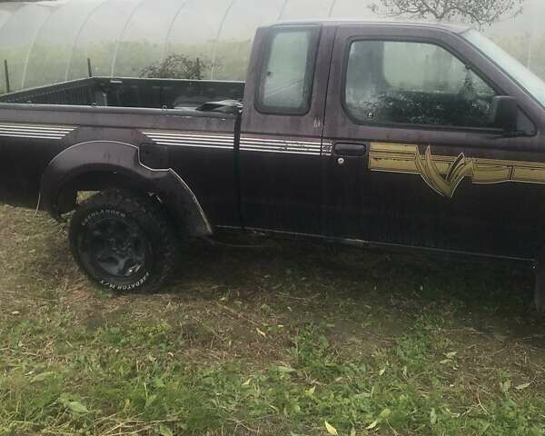 Коричневый Ниссан Навара, объемом двигателя 2.49 л и пробегом 290 тыс. км за 3786 $, фото 2 на Automoto.ua