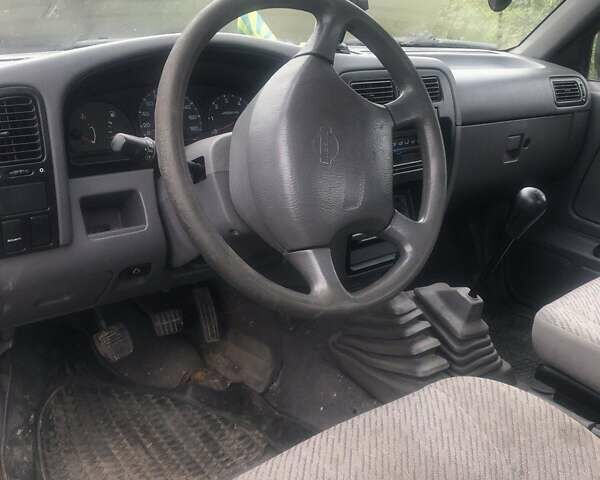 Коричневый Ниссан Навара, объемом двигателя 2.49 л и пробегом 290 тыс. км за 3786 $, фото 6 на Automoto.ua