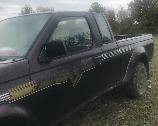 Коричневый Ниссан Навара, объемом двигателя 2.49 л и пробегом 290 тыс. км за 3786 $, фото 3 на Automoto.ua