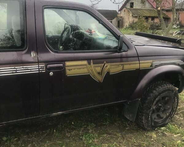 Коричневый Ниссан Навара, объемом двигателя 2.49 л и пробегом 290 тыс. км за 3786 $, фото 1 на Automoto.ua