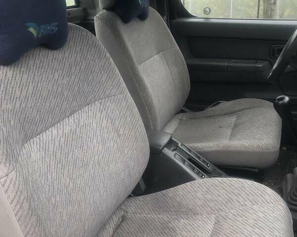 Коричневый Ниссан Навара, объемом двигателя 2.49 л и пробегом 290 тыс. км за 3786 $, фото 4 на Automoto.ua