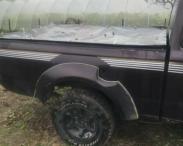 Коричневый Ниссан Навара, объемом двигателя 2.49 л и пробегом 290 тыс. км за 3786 $, фото 7 на Automoto.ua