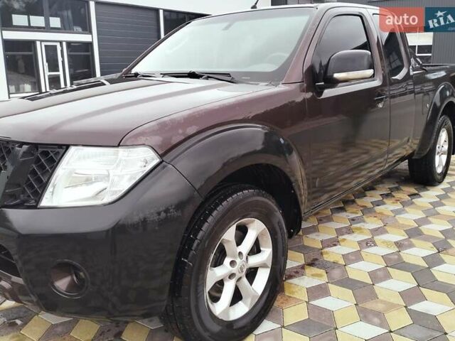 Коричневый Ниссан Навара, объемом двигателя 2.49 л и пробегом 218 тыс. км за 15000 $, фото 2 на Automoto.ua