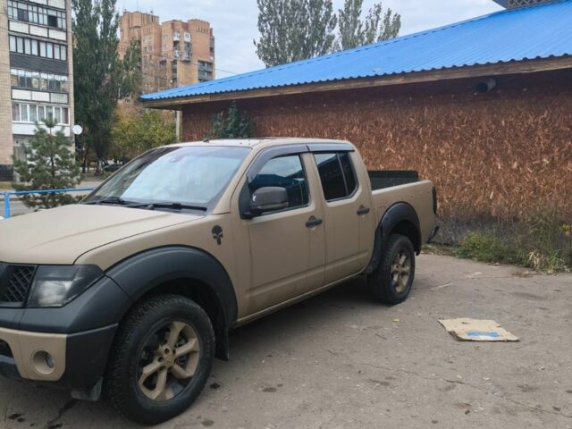 Коричневый Ниссан Навара, объемом двигателя 2.5 л и пробегом 160 тыс. км за 6800 $, фото 2 на Automoto.ua