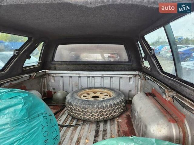 Серый Ниссан Навара, объемом двигателя 2.7 л и пробегом 240 тыс. км за 7999 $, фото 9 на Automoto.ua