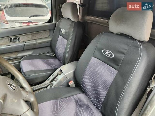 Серый Ниссан Навара, объемом двигателя 2.7 л и пробегом 240 тыс. км за 7999 $, фото 14 на Automoto.ua