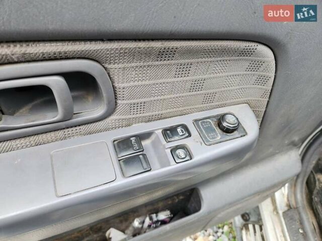 Серый Ниссан Навара, объемом двигателя 2.7 л и пробегом 240 тыс. км за 7999 $, фото 20 на Automoto.ua