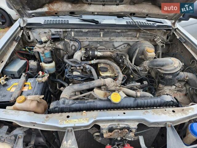 Серый Ниссан Навара, объемом двигателя 2.7 л и пробегом 240 тыс. км за 7999 $, фото 31 на Automoto.ua