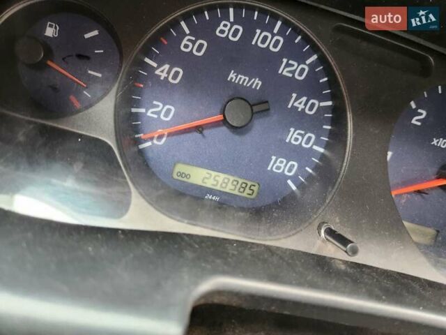 Серый Ниссан Навара, объемом двигателя 2.7 л и пробегом 240 тыс. км за 7999 $, фото 21 на Automoto.ua