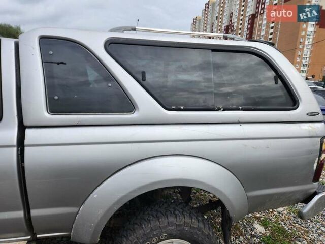 Серый Ниссан Навара, объемом двигателя 2.7 л и пробегом 240 тыс. км за 7999 $, фото 23 на Automoto.ua