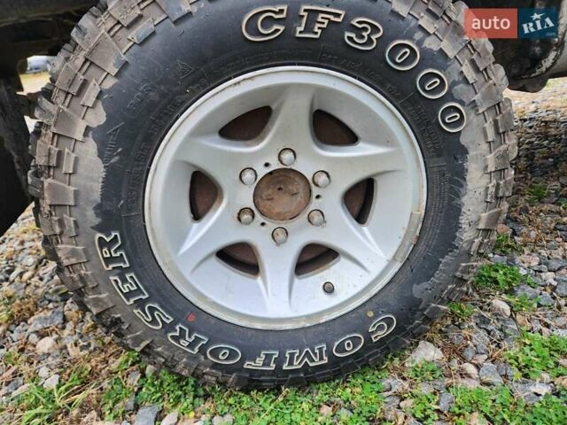 Серый Ниссан Навара, объемом двигателя 2.7 л и пробегом 240 тыс. км за 7999 $, фото 26 на Automoto.ua