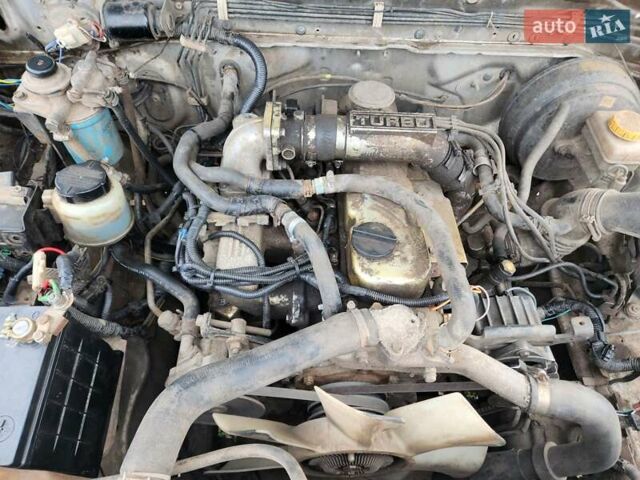 Серый Ниссан Навара, объемом двигателя 2.7 л и пробегом 240 тыс. км за 7999 $, фото 28 на Automoto.ua