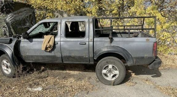 Серый Ниссан Навара, объемом двигателя 2.5 л и пробегом 260 тыс. км за 2000 $, фото 2 на Automoto.ua