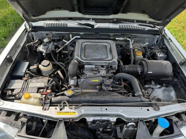 Сірий Ніссан Навара, об'ємом двигуна 2.5 л та пробігом 252 тис. км за 7000 $, фото 2 на Automoto.ua