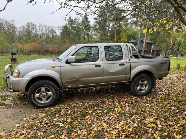 Сірий Ніссан Навара, об'ємом двигуна 2.5 л та пробігом 133 тис. км за 5600 $, фото 9 на Automoto.ua