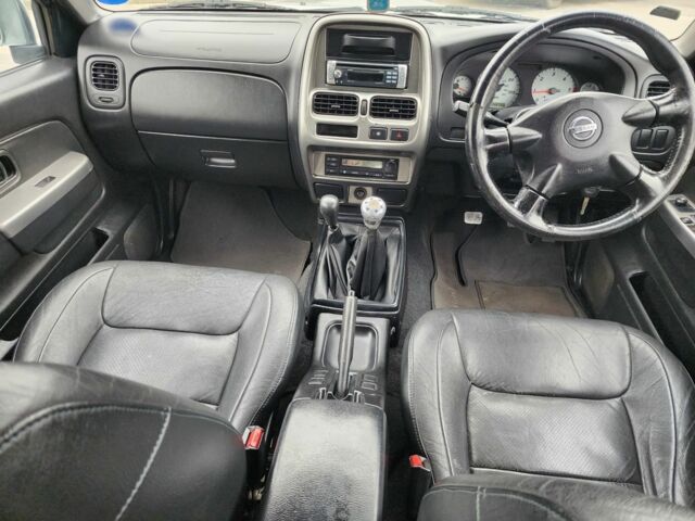 Серый Ниссан Навара, объемом двигателя 2.5 л и пробегом 149 тыс. км за 7203 $, фото 22 на Automoto.ua