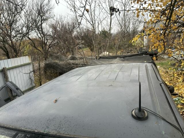 Серый Ниссан Навара, объемом двигателя 2.5 л и пробегом 197 тыс. км за 5100 $, фото 7 на Automoto.ua