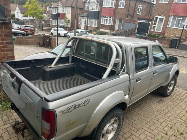 Сірий Ніссан Навара, об'ємом двигуна 2.5 л та пробігом 133 тис. км за 5600 $, фото 15 на Automoto.ua