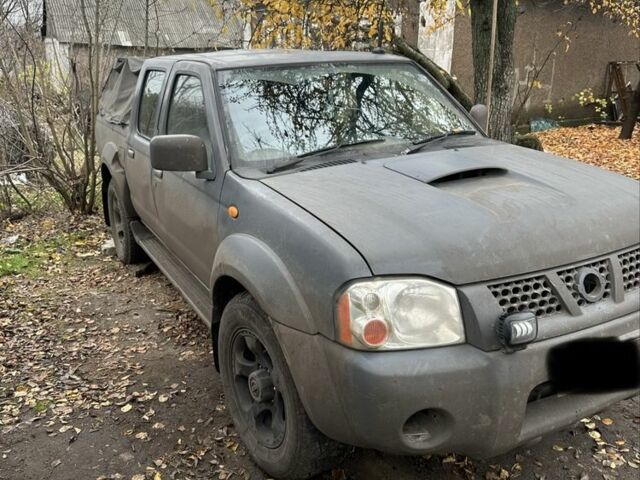 Серый Ниссан Навара, объемом двигателя 2.5 л и пробегом 197 тыс. км за 5100 $, фото 1 на Automoto.ua