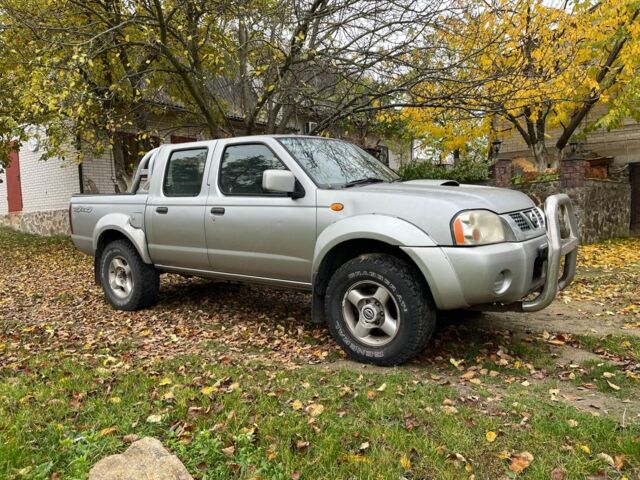 Сірий Ніссан Навара, об'ємом двигуна 2.5 л та пробігом 133 тис. км за 5600 $, фото 11 на Automoto.ua