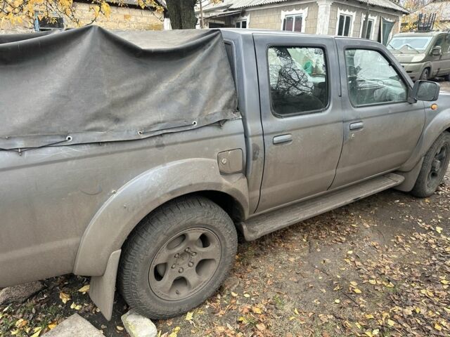 Серый Ниссан Навара, объемом двигателя 2.5 л и пробегом 197 тыс. км за 5100 $, фото 4 на Automoto.ua