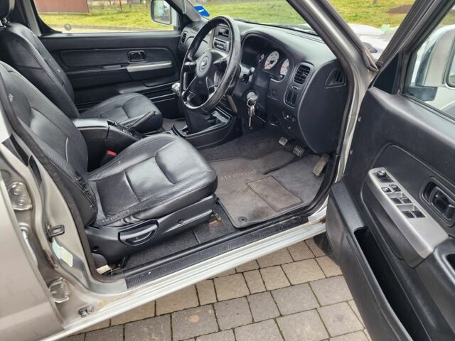 Серый Ниссан Навара, объемом двигателя 2.5 л и пробегом 149 тыс. км за 7203 $, фото 12 на Automoto.ua