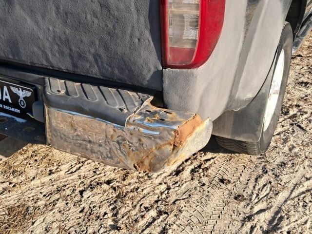 Серый Ниссан Навара, объемом двигателя 2.5 л и пробегом 240 тыс. км за 6000 $, фото 7 на Automoto.ua