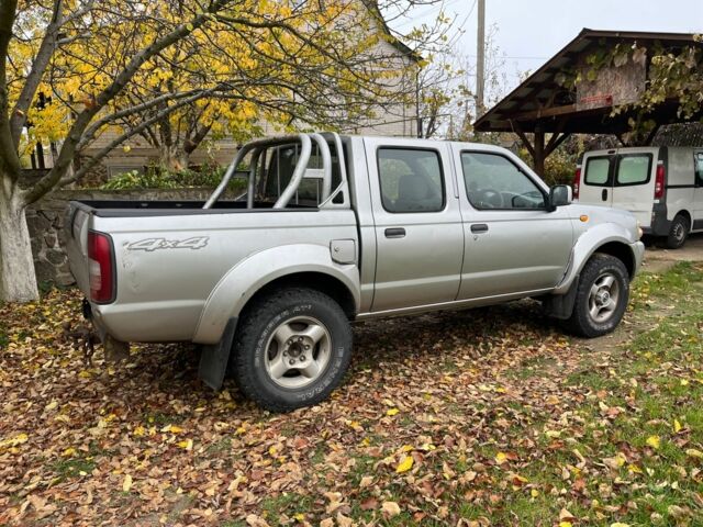 Сірий Ніссан Навара, об'ємом двигуна 2.5 л та пробігом 133 тис. км за 5600 $, фото 10 на Automoto.ua