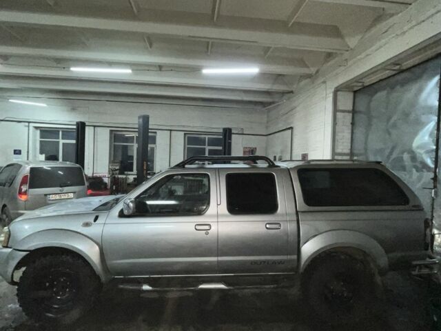 Серый Ниссан Навара, объемом двигателя 2.5 л и пробегом 171 тыс. км за 5937 $, фото 4 на Automoto.ua