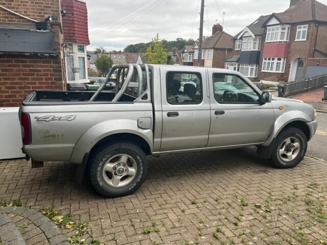 Сірий Ніссан Навара, об'ємом двигуна 2.5 л та пробігом 133 тис. км за 5600 $, фото 17 на Automoto.ua