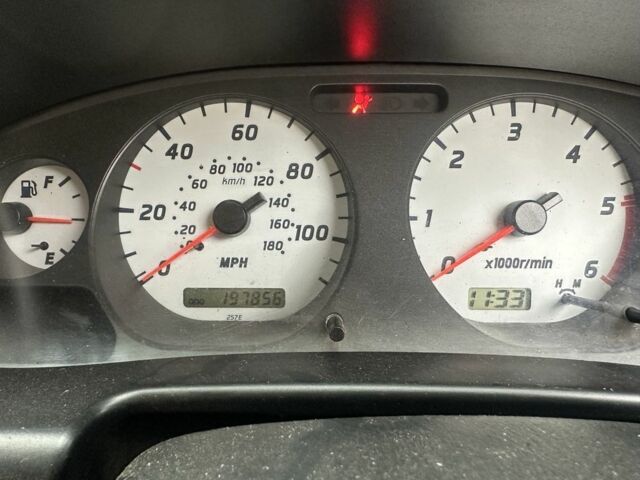 Серый Ниссан Навара, объемом двигателя 2.5 л и пробегом 197 тыс. км за 5100 $, фото 5 на Automoto.ua