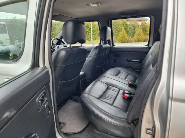 Серый Ниссан Навара, объемом двигателя 2.5 л и пробегом 149 тыс. км за 7203 $, фото 20 на Automoto.ua