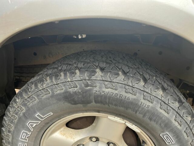 Сірий Ніссан Навара, об'ємом двигуна 2.5 л та пробігом 133 тис. км за 5600 $, фото 13 на Automoto.ua