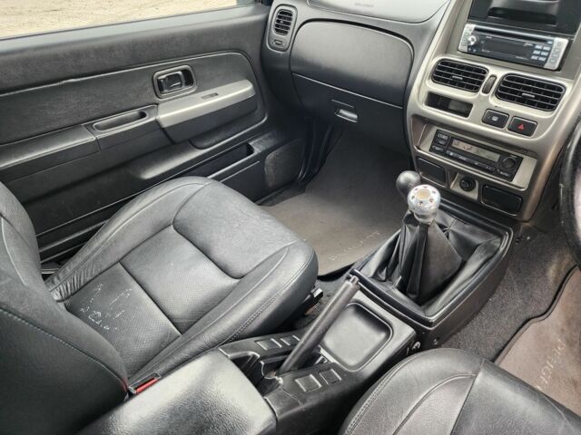 Серый Ниссан Навара, объемом двигателя 2.5 л и пробегом 149 тыс. км за 7203 $, фото 15 на Automoto.ua