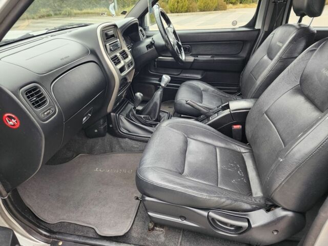 Серый Ниссан Навара, объемом двигателя 2.5 л и пробегом 149 тыс. км за 7203 $, фото 18 на Automoto.ua