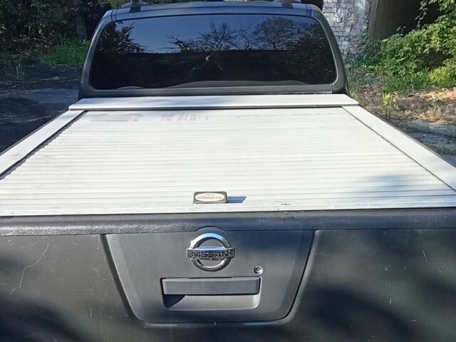 Серый Ниссан Навара, объемом двигателя 2.5 л и пробегом 180 тыс. км за 5500 $, фото 5 на Automoto.ua