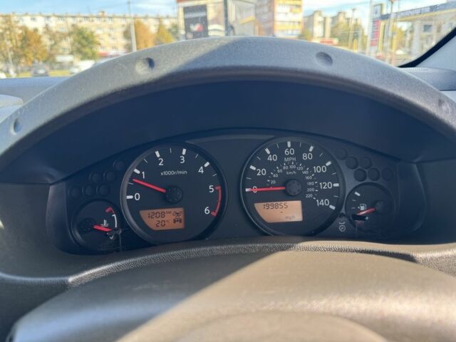 Серый Ниссан Навара, объемом двигателя 2.5 л и пробегом 140 тыс. км за 5350 $, фото 6 на Automoto.ua