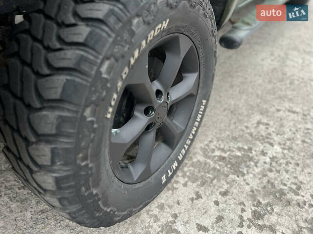 Серый Ниссан Навара, объемом двигателя 2.49 л и пробегом 340 тыс. км за 8500 $, фото 9 на Automoto.ua