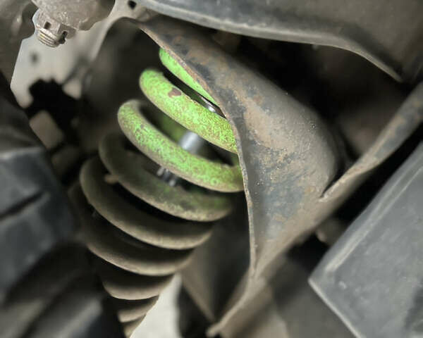 Серый Ниссан Навара, объемом двигателя 2.49 л и пробегом 340 тыс. км за 8500 $, фото 8 на Automoto.ua