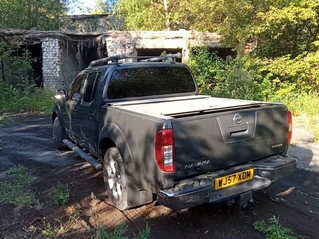 Серый Ниссан Навара, объемом двигателя 2.5 л и пробегом 180 тыс. км за 5500 $, фото 2 на Automoto.ua
