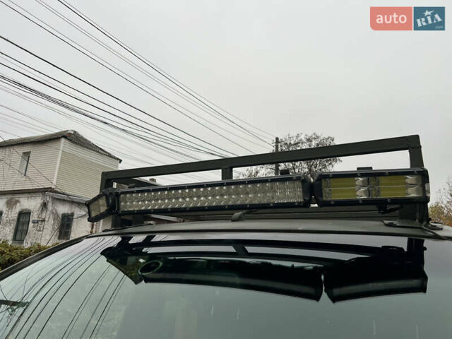 Серый Ниссан Навара, объемом двигателя 2.49 л и пробегом 340 тыс. км за 8500 $, фото 10 на Automoto.ua