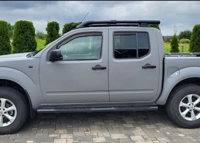 Серый Ниссан Навара, объемом двигателя 2.5 л и пробегом 203 тыс. км за 5200 $, фото 4 на Automoto.ua