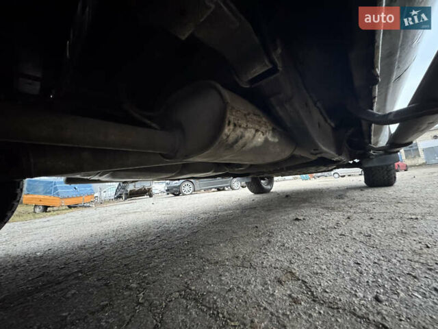 Сірий Ніссан Навара, об'ємом двигуна 2.49 л та пробігом 370 тис. км за 10000 $, фото 11 на Automoto.ua