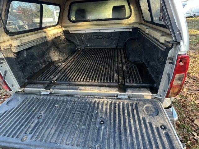 Серый Ниссан Навара, объемом двигателя 2.5 л и пробегом 81 тыс. км за 5999 $, фото 4 на Automoto.ua