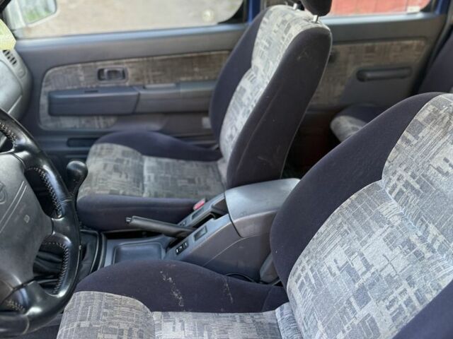 Синий Ниссан Навара, объемом двигателя 2.5 л и пробегом 250 тыс. км за 4200 $, фото 5 на Automoto.ua